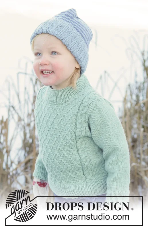 50-16 Chilly Charm Sweater by DROPS Design risnedsättning