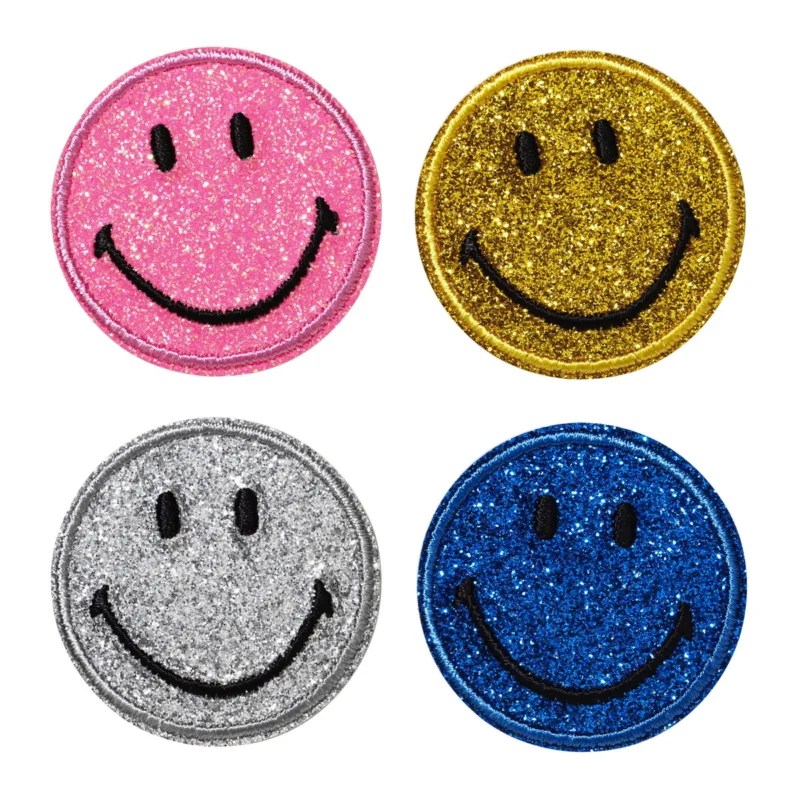 Iron-on tygmärke 4 glittande smileys i 4 olika färger Ø40 mm Snabb leverans