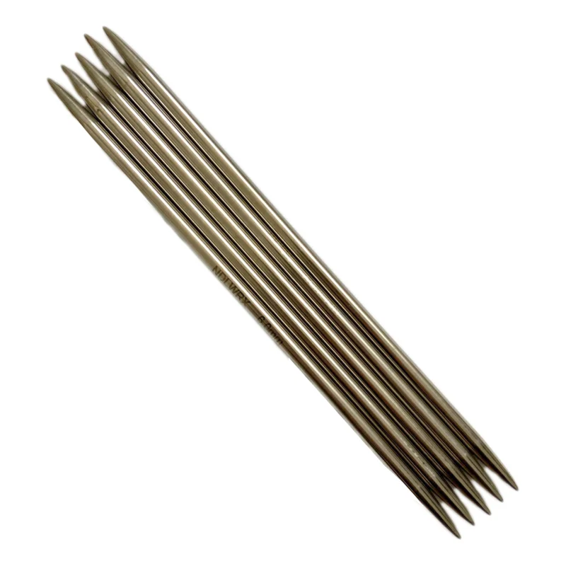 Strumpstickor i metall I lager
