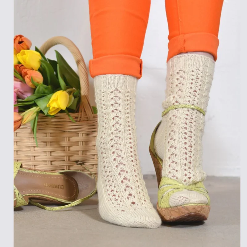 Snabb frakt Spetsstickade sockor i Pallas