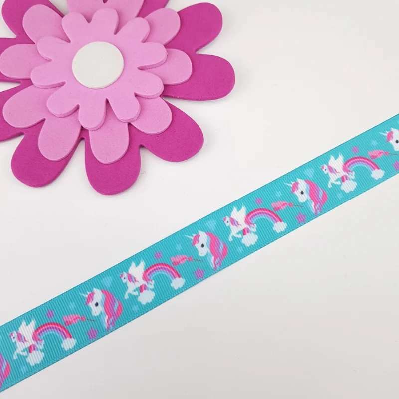 Lägg i varukorgen Band 22 mm Rosa turkos Enhörningar Per löpm