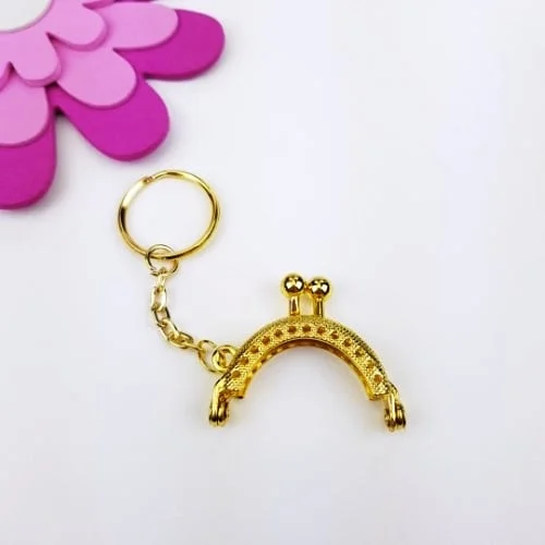 Begränsad tid Börsbygel Mini m nyckelring Guld 4 cm nr 07
