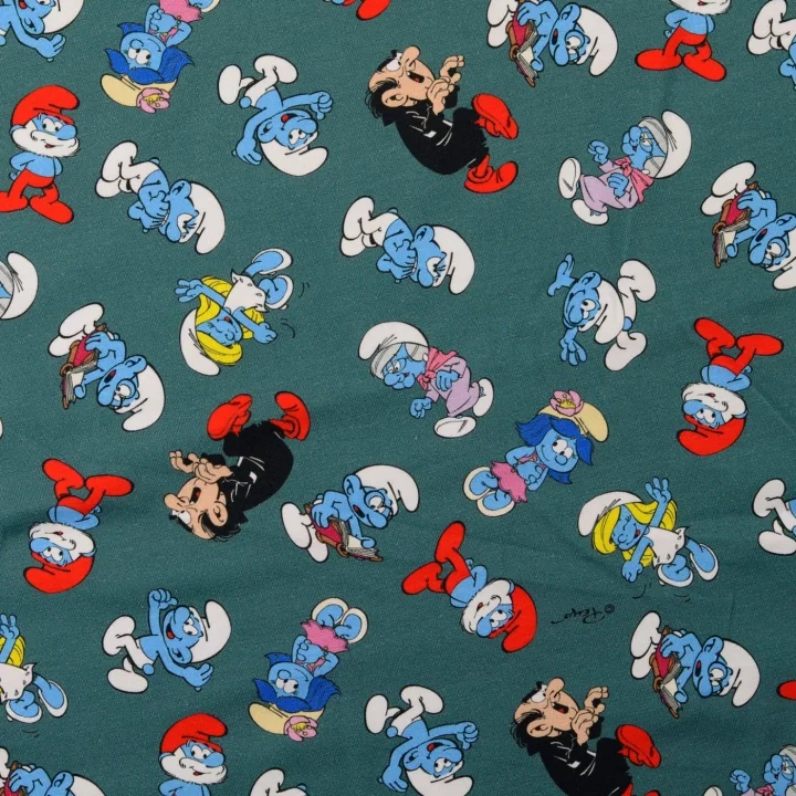 Endast idag Trikåtyg Smurfarna - Grön botten
